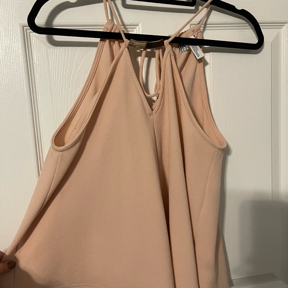 Slinky pink tank with adjustable ties